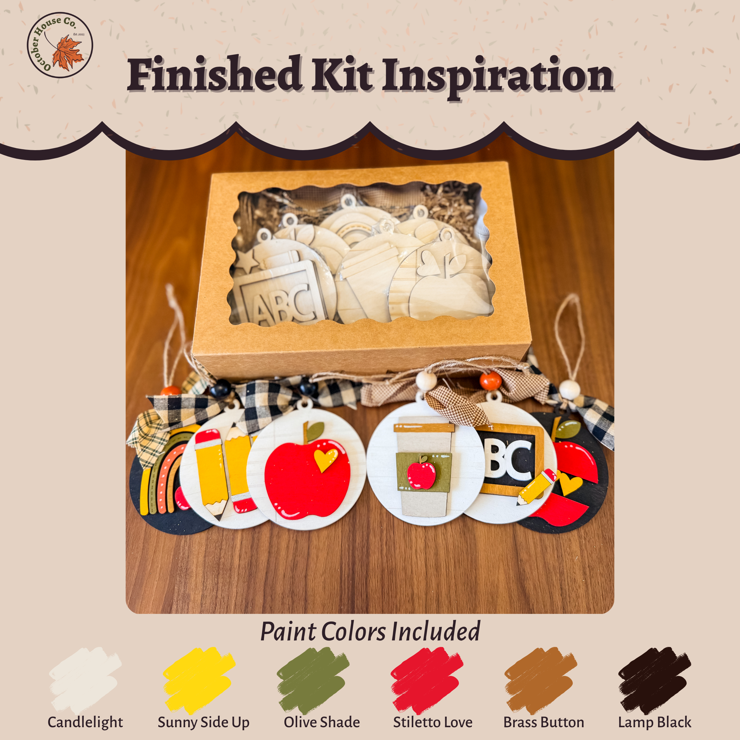 Wooden kit with decorative items and paint color swatches on a beige background
